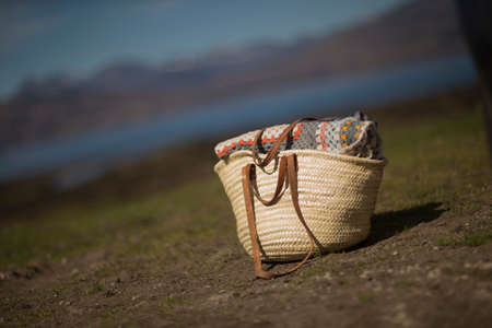 Bag on ground with blanketの写真素材