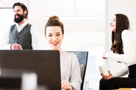 Young woman using computer