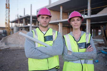 Portrait of surveyor and architect on construction siteの写真素材