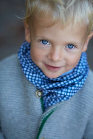 Portrait of cute boy with blue eyes