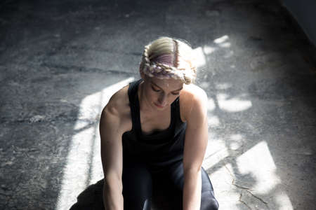 Dancer stretching in studio