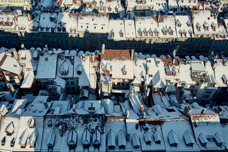 Overhead view of snow covered rooftops, Berne, Switzerlandの写真素材