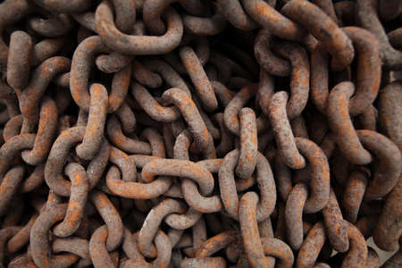 Close up of rusted metal chainsの写真素材