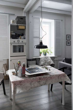 Room interior, artist materials on tableの写真素材