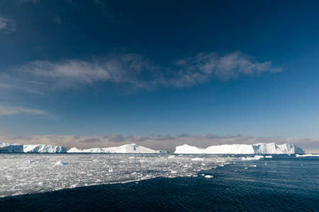 View of sea ice and icebergs, Ilulissat icefjord, Disko Bay, Greenlandの写真素材