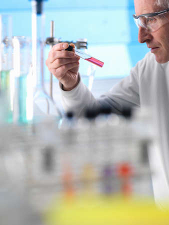 Scientist preparing chemical experiment in laboratory