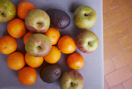 Selection of fruit on table, overhead view