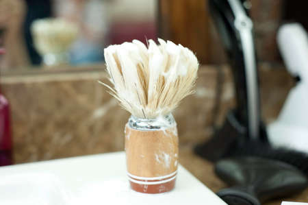 Shaving cream covered shaving brush