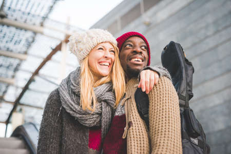 Couple smiling, leaving mallの写真素材