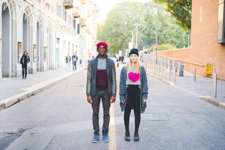 Couple standing on streetの写真素材