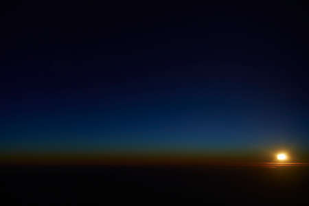 Aerial view of sunrise over cloudscape