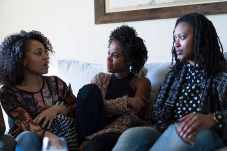 Female friends relaxing at home