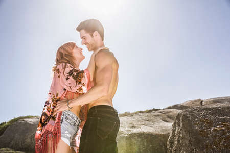 Couple outdoors, face to face, smilingの写真素材