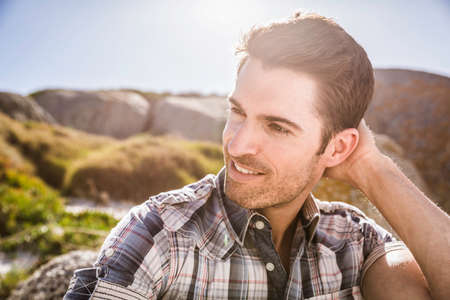 Mid adult man, outdoors, looking awayの写真素材