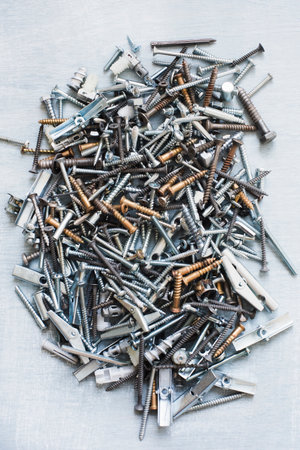 Cluster of screws and nails