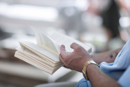 Man reading bookの写真素材