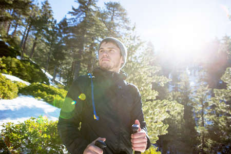 Hiker enjoying view, Mount Baldy, Californiaの写真素材