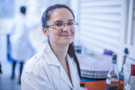 Portrait of young woman in laboratoryの写真素材