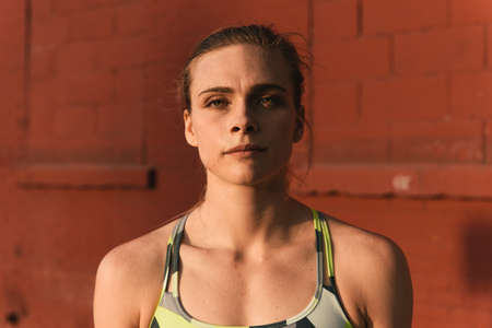 Portrait of young woman wearing sports clothingの写真素材