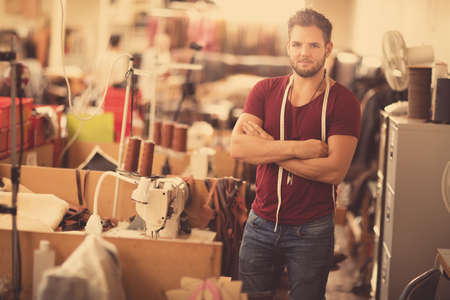 Portrait of male worker in leather jacket manufacturersの写真素材