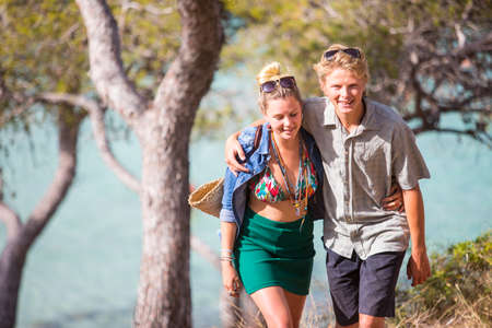 Couple with arms around each other smiling, Majorca, Spain