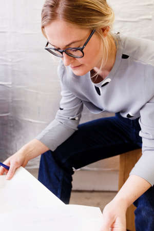 Women sitting looking at paperwork