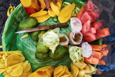 Overhead view of freshly sliced fruit in basket,  Antigua, Guatemalaの写真素材