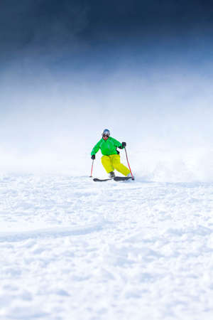 Skier, skiing downhill, low angle viewの写真素材