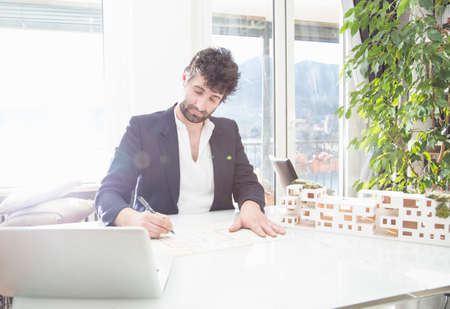 Architect working in office