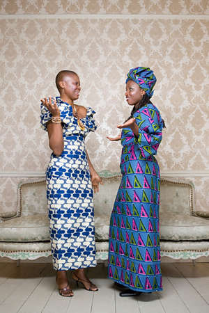 Two women in traditional clothingの写真素材