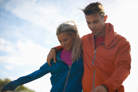 Couple walking together smiling