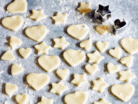 Heart and star shapes cookies with cookie cutters
