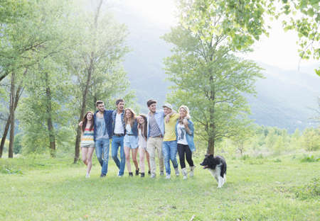 Group of eight young adult friends and their dog, Piemonte, Italyの写真素材
