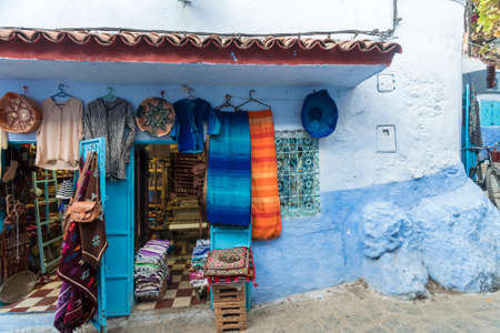 Morocco, Chefchaouen, Souvenirs for sale at traditional blue houseのeditorial素材