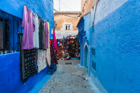 Morocco, Chefchaouen, Cobblestone alley and souvenirs for saleのeditorial素材