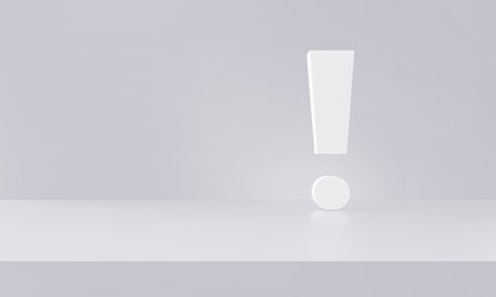 Exclamation mark isolated on greyの写真素材