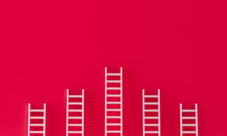 Ladder collection against the red wallの写真素材