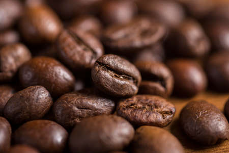 Macro roasted coffee beans. Aroma of fresh coffee.