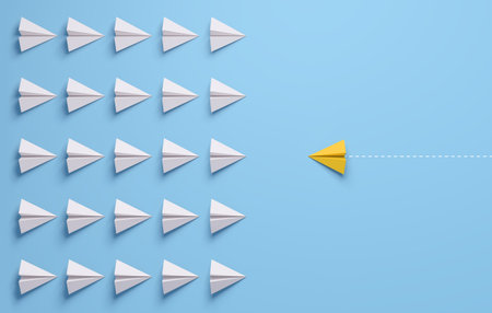 Paper airplanes face to face in battle formation. A confrontation yellow lead. Change concepts. 3d rendering.の写真素材