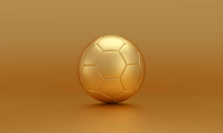 Golden soccer ball isolated on gold background. 3D rendering.の写真素材
