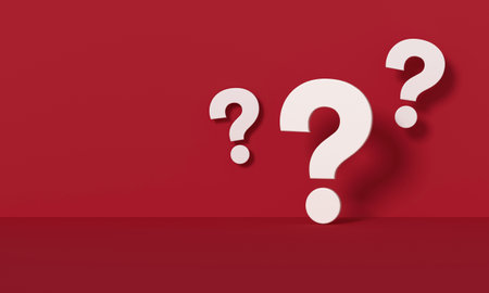Three white question marks in front of a red wall background. 3D rendering.の写真素材