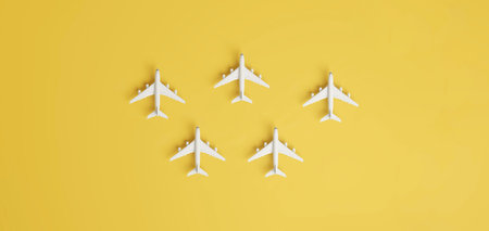 Aircraft travelling to different destinations on yellow background. 3D rendering.の写真素材