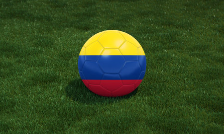 Soccer ball with Colombia flag colors at a stadium on green grasses background. 3D illustration.の写真素材