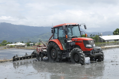 Farmers use tractorのeditorial素材
