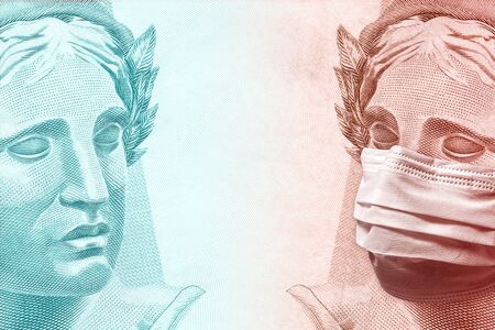 Concept for economic impact of the coronavirus pandemic. Two Brazilian Real - BRL currency banknote faces. One of them is healthy and the other wears a mask.の写真素材