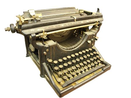 Very old typewriter isolated on whiteの写真素材