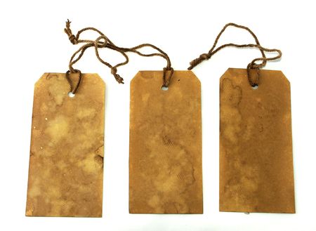 Large stained tags with stringsの写真素材