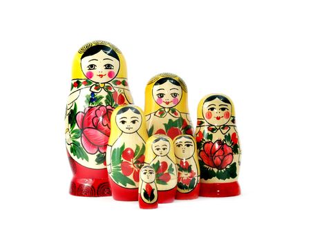 A large group of Russian nesting dolls isolated on whiteの写真素材