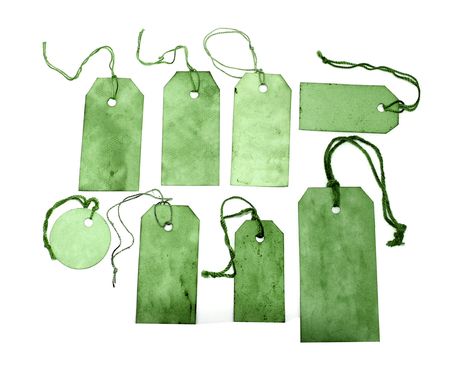 Green grungy tags isolated on whiteの写真素材