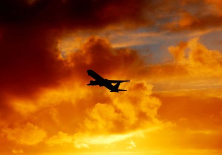 Plane at sunsetの写真素材